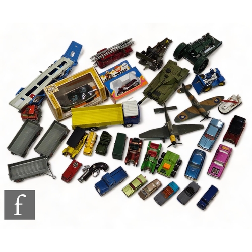 222 - An assorted collection of mostly unboxed diecast models, to include military vehicles, sportscars, v... 