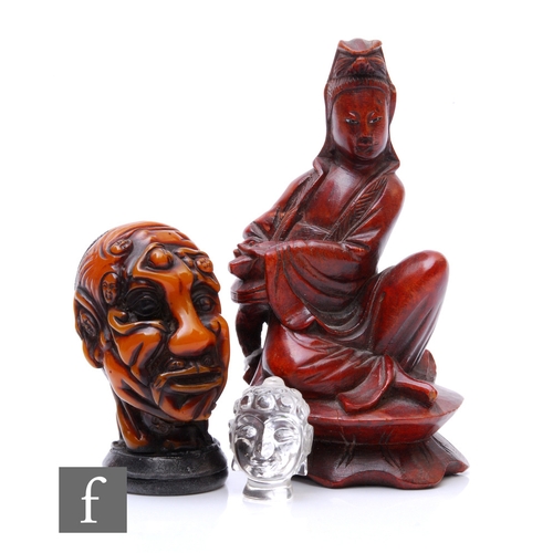 883 - A collection of Chinese items, to include a Chinese carved amber style erotic head seal, height 8cm,... 