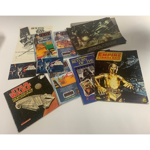 33 - A collection of assorted vintage Star Wars items, to include Thomas Salter Action Transfers, a Lyons... 