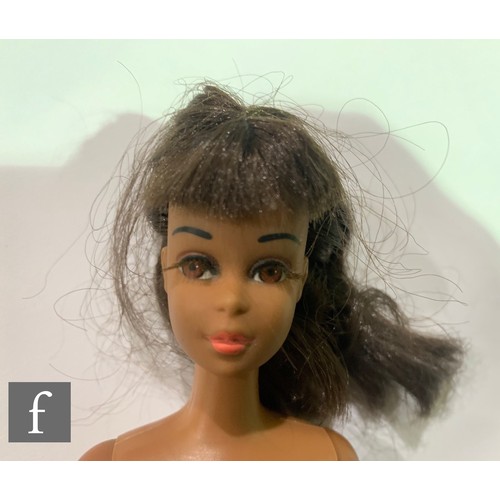 93 - A 1960s Mattel Barbie Francie doll, black with dark brown hair.