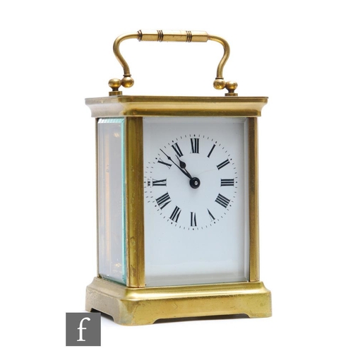 288 - An early 20th Century French lacquered brass and bevelled glass cased carriage clock by Duverdry &am... 