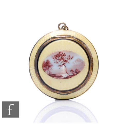 130 - An early 20th Century French silver gilt compact pendant with central oval lake land scene within ye... 