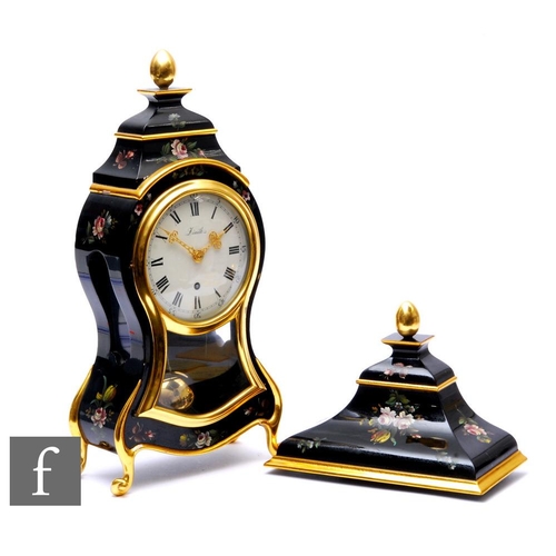 280 - A 20th Century Zenith balloon shaped bracket clock with bracket, painted floral decoration on a blac... 