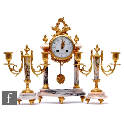 281 - An early 20th Century French gilt marble clock garniture, eight day movement surmounted with a quive... 