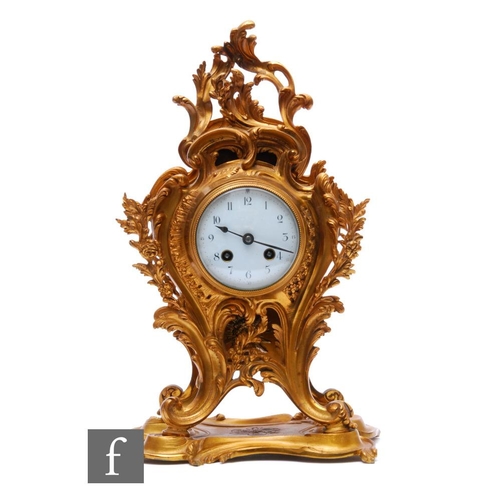 284 - An early 20th Century gilt rococo cased mantel clock, circular white enamelled dial within an acanth... 