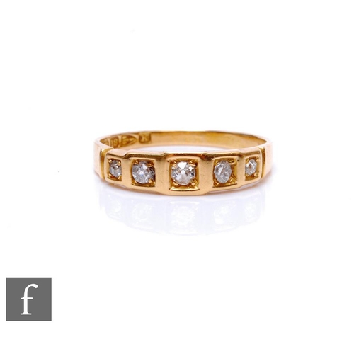 66 - An early 20th Century 18ct hallmarked graduated diamond three stone ring, each set to a square borde... 