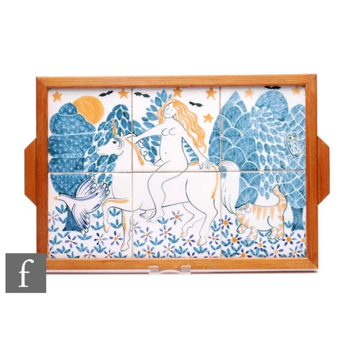 752 - A framed later 20th Century tile panel formed from six 6 inch tiles, decorated with a female figure ... 