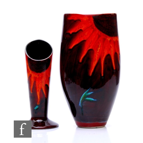 838 - A pair of Anita Harris studio pottery vases, the first of compressed ovoid form, the other of footed... 