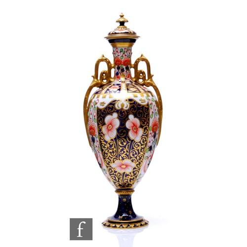 847 - AMENDED DESCRIPTION A Royal Crown Derby shape 1369 twin handled vase and cover decorated in the 6299... 