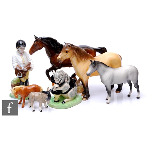 868 - A collection of porcelain horse figures, to include three Beswick, a Royal Doulton Thelwell figure, ... 