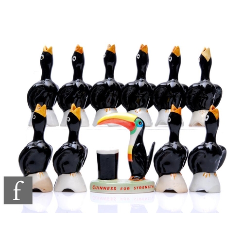 874 - Ten 20th Century ceramic novelty pie funnels modelled as blackbirds, six marked Midwinter, three mar... 