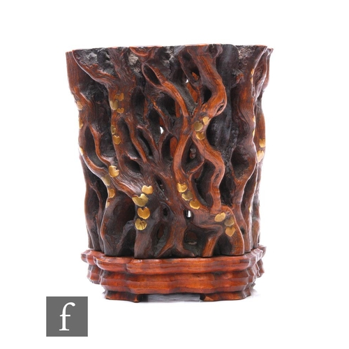 886 - A Chinese late Qing Dynasty carved hardwood brushpot bitong, the carved sides formed from naturalist... 