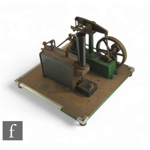 309 - A large Stuart stationary model of a beam engine, painted green, with oscillating flywheel with chim... 