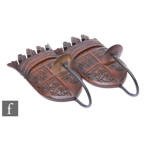 319 - A pair of 19th Century carved oak and single iron picket wall sconces, in the form of English and Fr... 