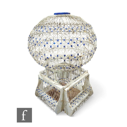 345 - An early 20th Century French balloon birdcage, the blue and white painted wirework frame with painte... 