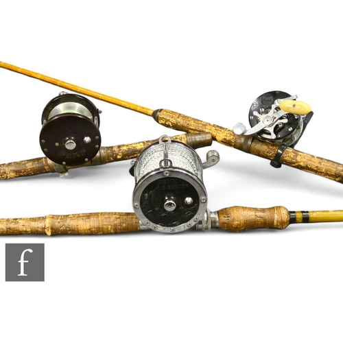 351 - Two American Penn No 85 and 160 multiplier fishing reels and a Penn 4/0 reel, all mounted on base se... 