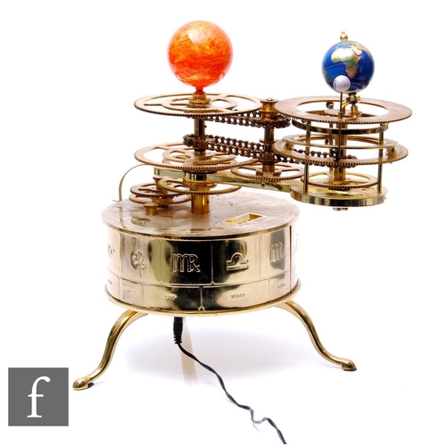 357 - A modern brass battery operated orrery, with earth, moon and the sun, height 35cm.