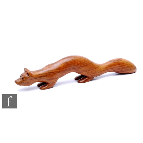 359 - A contemporary studio crafted wooden figure of a stylised fox in crouching pose, signed in monogram ... 