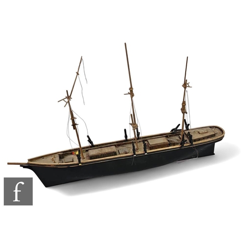 374 - A 20th Century wooden scale of a twin masted barque, painted black, length 90cm.