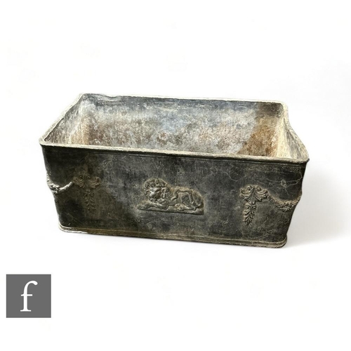 480 - A 19th Century or later rectangular lead planter, the side applied with swags and recumbent lions, h... 