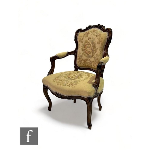 508 - A 19th Century French fauteuil elbow chair, the shaped scroll cartouche back over slender cabriole l... 