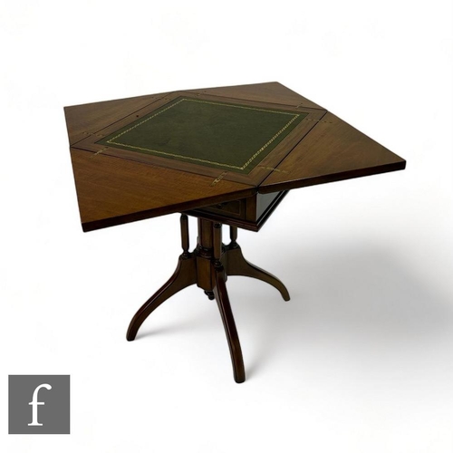 511 - An Edwardian style marquetry inlaid mahogany envelope card table, the top decorated with panels of a... 