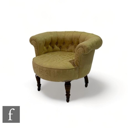 523 - An Edwardian mahogany tub shaped easy chair on cabriole legs to the front, upholstered in buttoned g... 