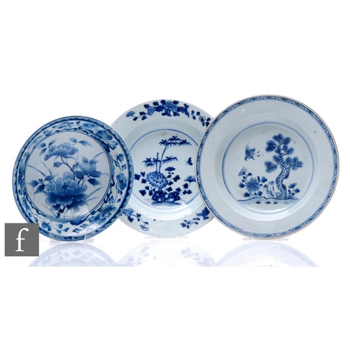 890A - Two 18th Century Chinese blue and white export porcelain plates, each of circular from, decorated wi... 