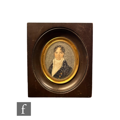 399 - ENGLISH SCHOOL (EARLY 19TH CENTURY) - Portrait of a young man wearing a blue top coat and stock, wat... 