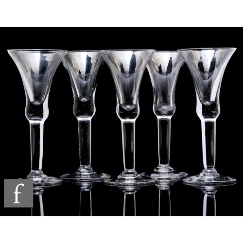 1136 - A set of five 20th Century drinking glasses in the 18th Century taste, each with flared trumpet bowl... 