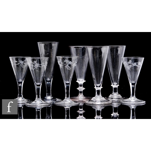 1138 - A collection of 19th Century drinking glasses to include champagnes, to include four with conical bo... 