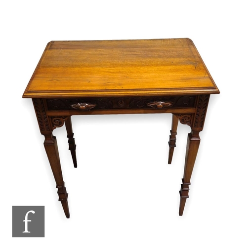 461 - A Victorian satin walnut small side table, with single frieze carved drawer, on slender square taper... 