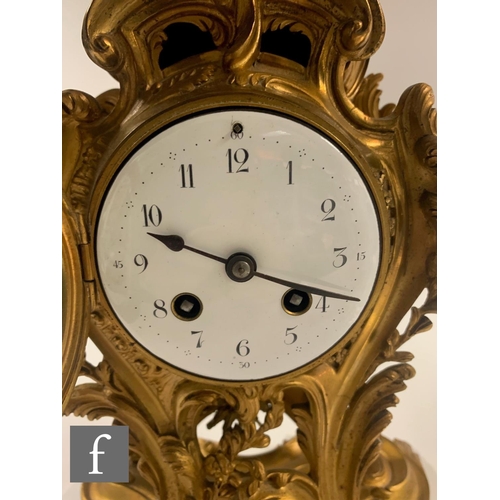 284 - An early 20th Century gilt rococo cased mantel clock, circular white enamelled dial within an acanth... 