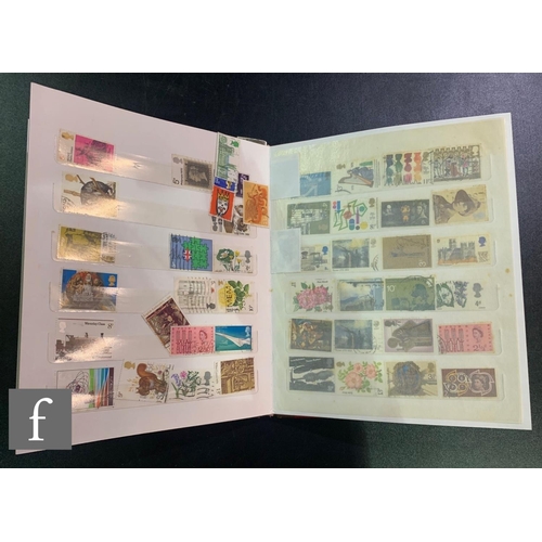 385 - Four British stock books of early mint and used stamps with later first class commemorative issues, ... 