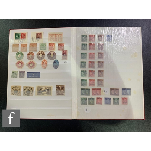 385 - Four British stock books of early mint and used stamps with later first class commemorative issues, ... 