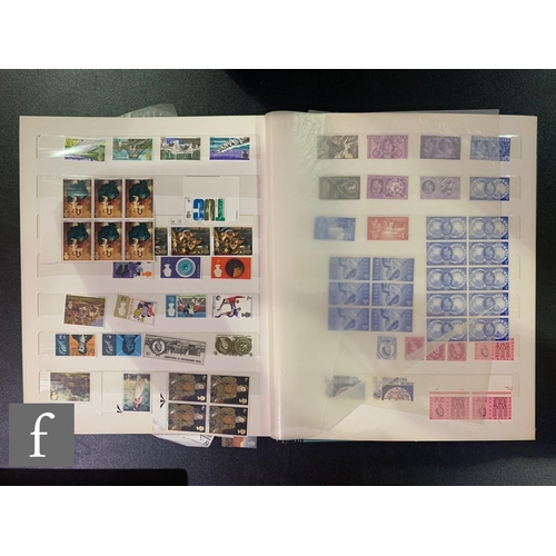 385 - Four British stock books of early mint and used stamps with later first class commemorative issues, ... 