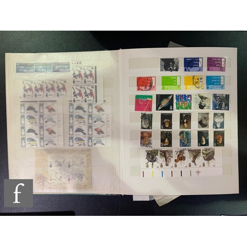 385 - Four British stock books of early mint and used stamps with later first class commemorative issues, ... 