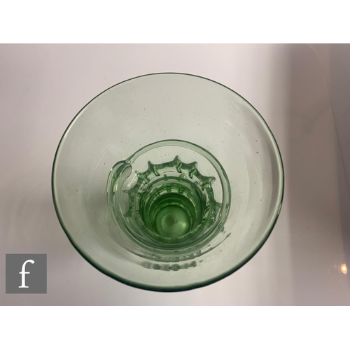 940 - A set of contemporary hand blown reproduction green drinking glasses in the style of a German Mediev... 