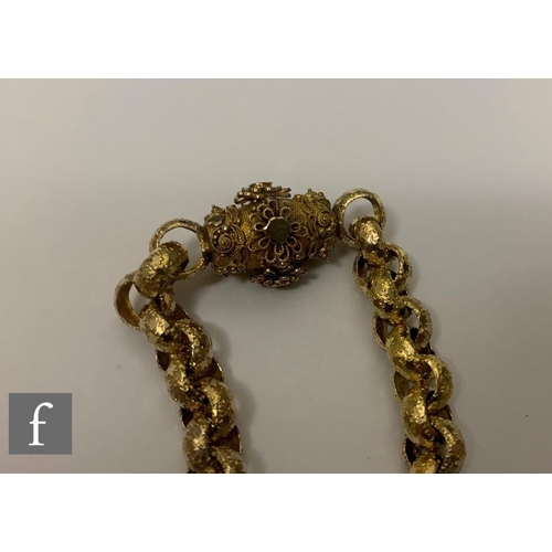 7 - A 19th Century 9ct fancy belcher link chain, weight 38.5g, length 77cm, terminating in a fancy tongu... 