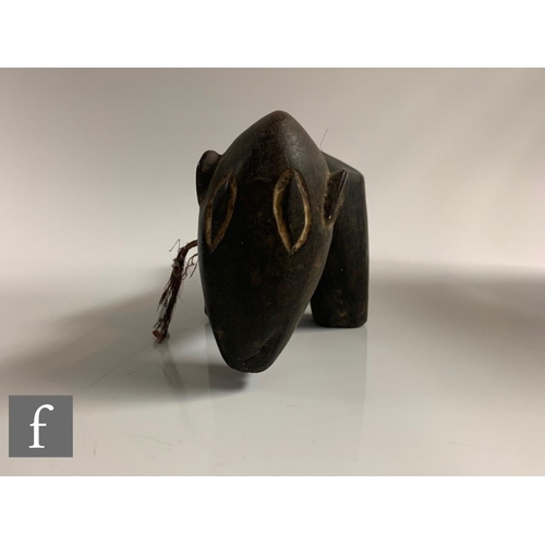 337 - An early 20th Century Ngoni style African tribal head rest with natural string tail and shell collar... 