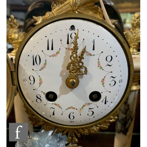 281 - An early 20th Century French gilt marble clock garniture, eight day movement surmounted with a quive... 