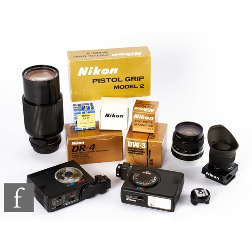 123 - A collection of Nikon camera accessories and various lenses, to include boxed items DR-4, right angl... 