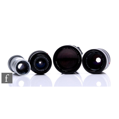 138 - A collection of Leica camera lenses to include Leica f4.8 280mm Teylt telephoto lens, serial number ... 