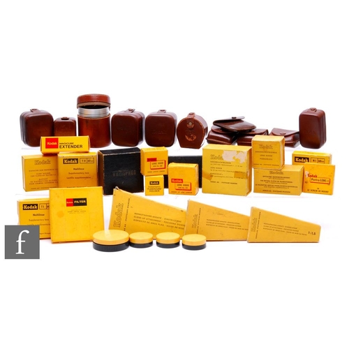 154 - A collection of Kodak and related camera accessories, to include Rodenstock Retina-Rotelar 135mm f4 ... 