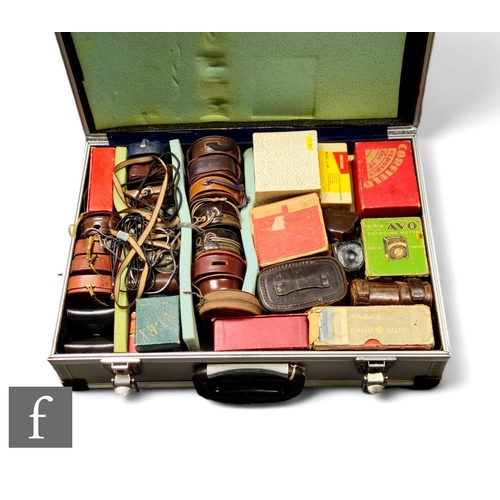 156 - A quantity of various camera exposure and light meters, various makers, mostly cased or boxed, conta... 