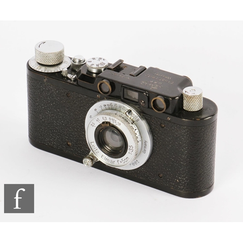 84 - A Leica III set, comprising camera body, various lenses and accessories in fitted case.