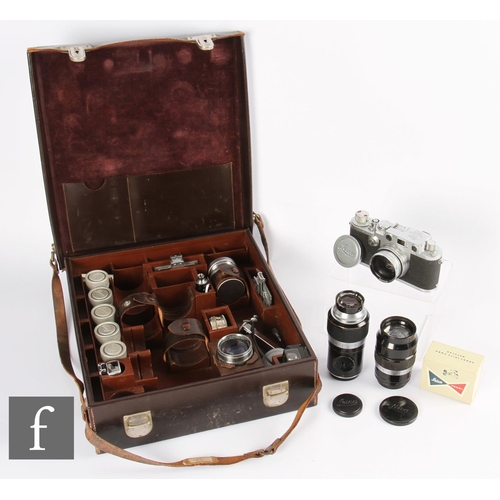 86 - A Leica IIIf camera outfit to include Leica body serial number 632825, with Summitar f2, 5cm lens se... 