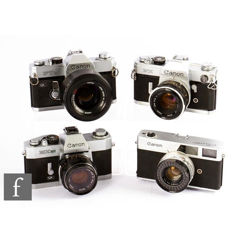 95 - A collection of Canon 35mm SLR cameras to include Canon FTb with Canon 55mm f1.2 lens, serial number... 