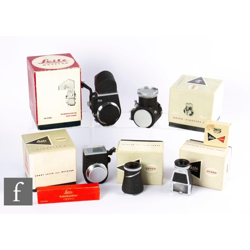 97 - A collection of Leica accessories, to include Visoflex III, numbered 16498, boxed, Visoflex II OTYDO... 