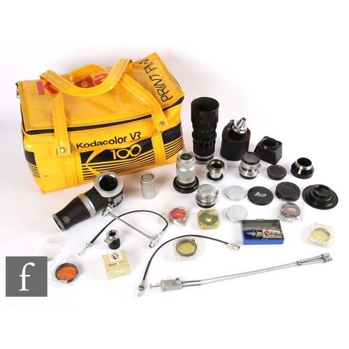 163 - A collection of Leica lens and accessories, to include Leitz Elmar f3.5 50mm collapsible lens, Leitz... 